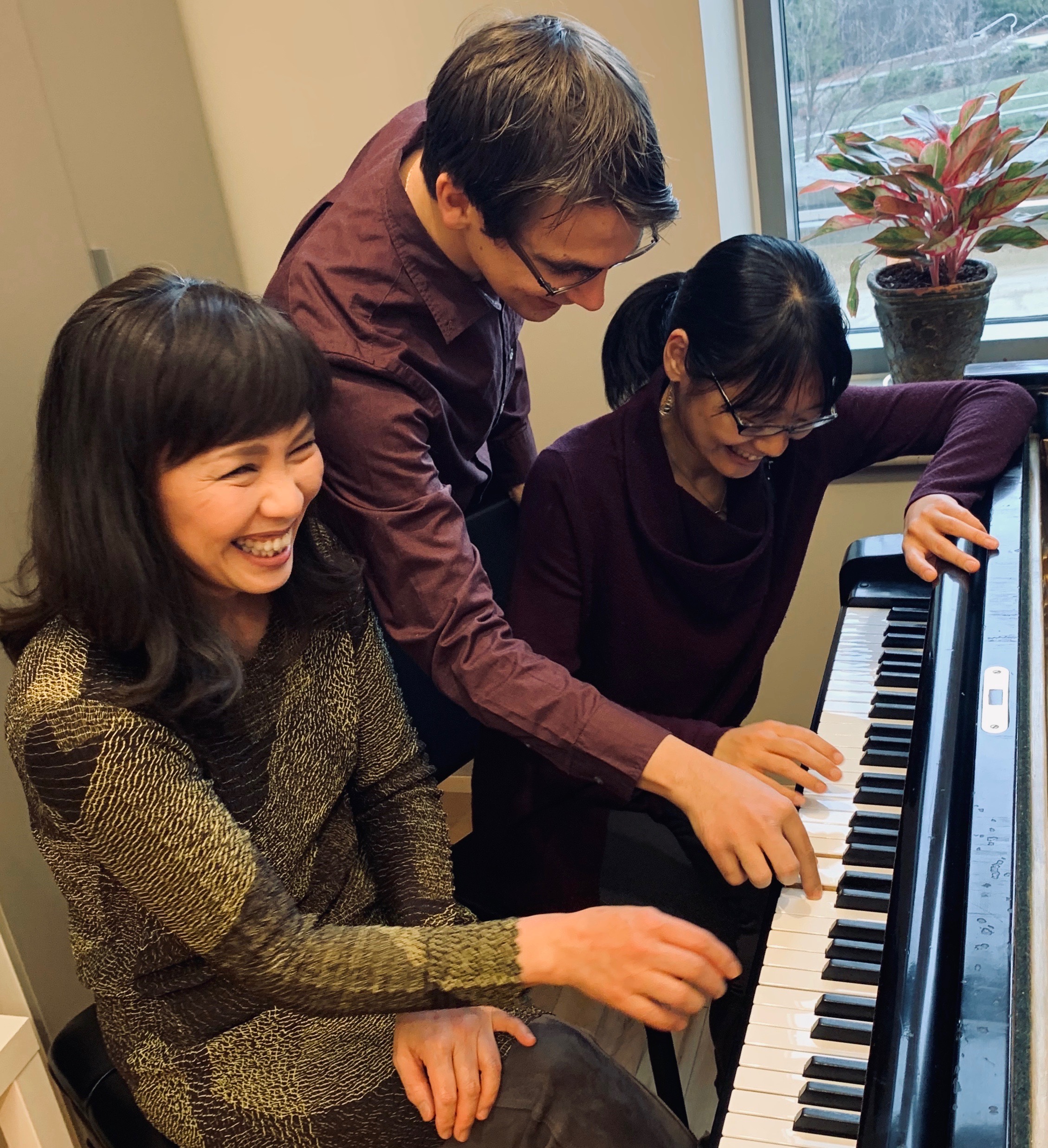 Dr.Ioannides instructing two female students